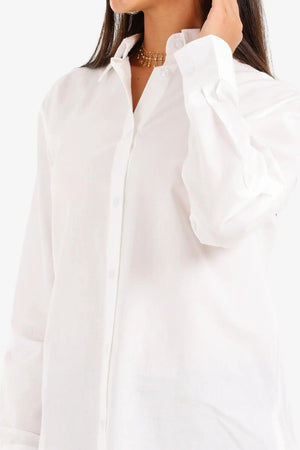 قميص مريح طويل ومنخفض