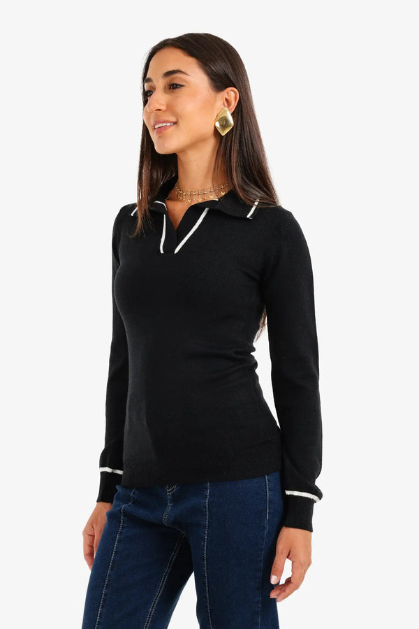 Knitted sweater with a contrasting panel