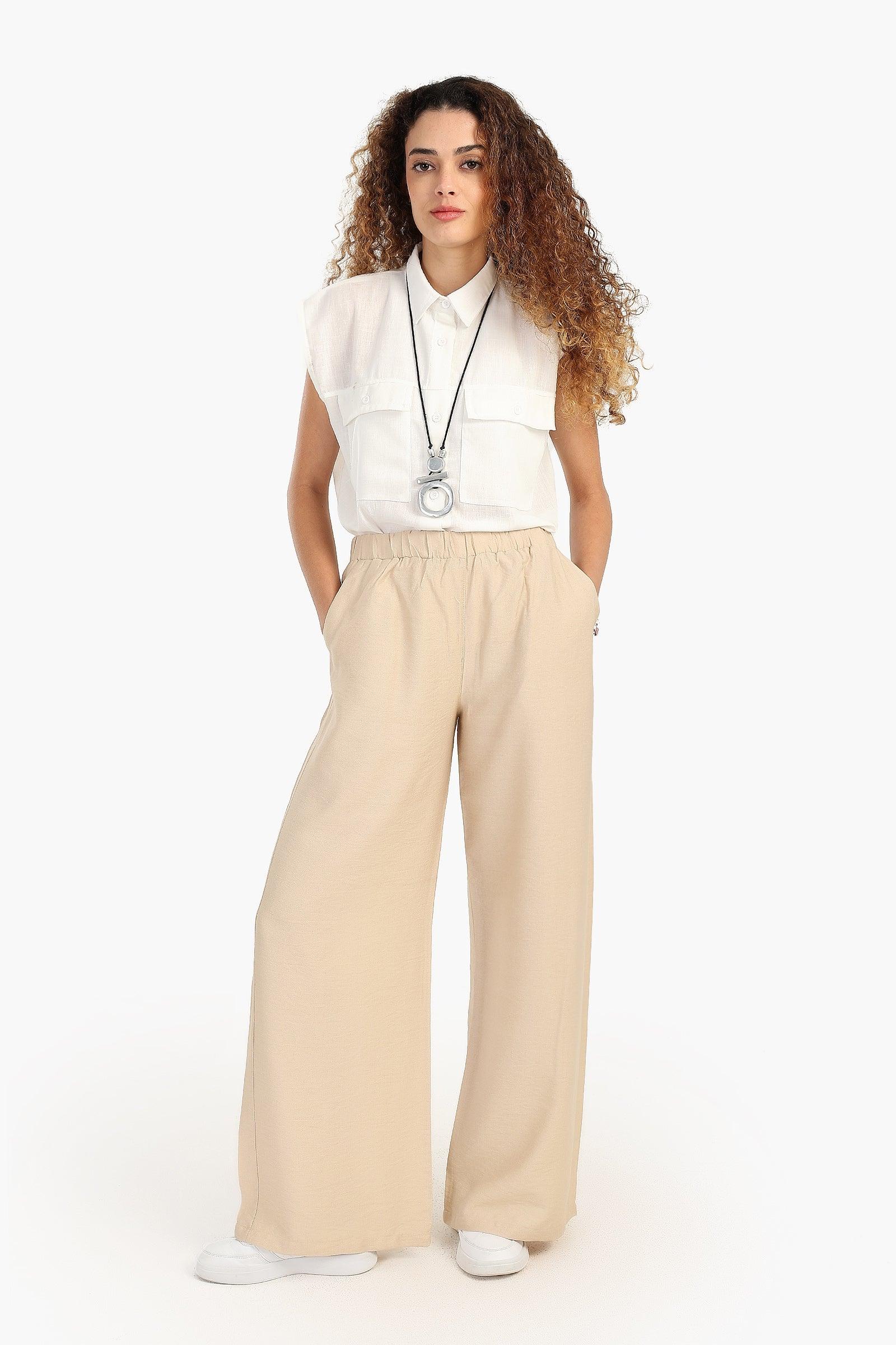 بنطال بخصر عالي و بقصة ساق واسعة - Carinasaudi.com