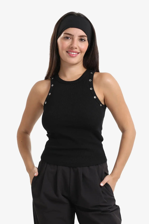 The top is decorated with metal buttons.