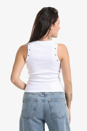 The top is decorated with metal buttons.