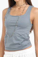 بلوزة سادة بدون اكمام - Carinasaudi.com