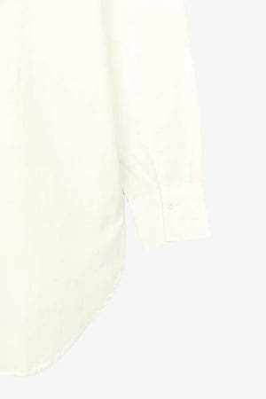 قميص مريح طويل ومنخفض