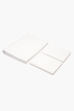 Folded white cotton bed sheets set on a white background