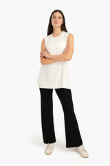 بلوزة طويلة بدون اكمام بفتحة جانبية - Carinasaudi.com