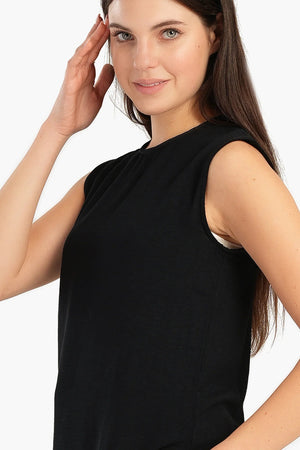 Long sleeveless blouse with side slit