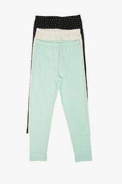 Set of three women’s cotton leggings in mint, white, and black with small white dots