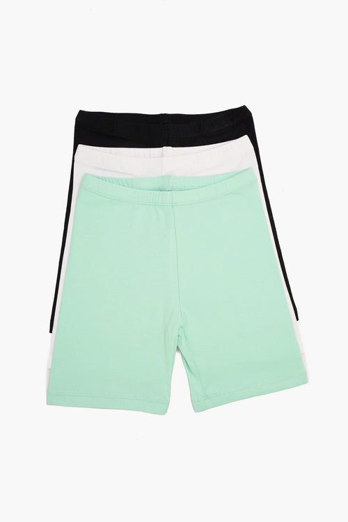 Set of three women's cotton shorts in mint, white, and black colors, laid flat on white background