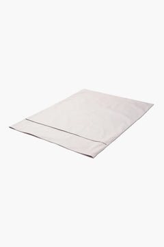 Soft white cotton pillowcase with simple design on a plain background