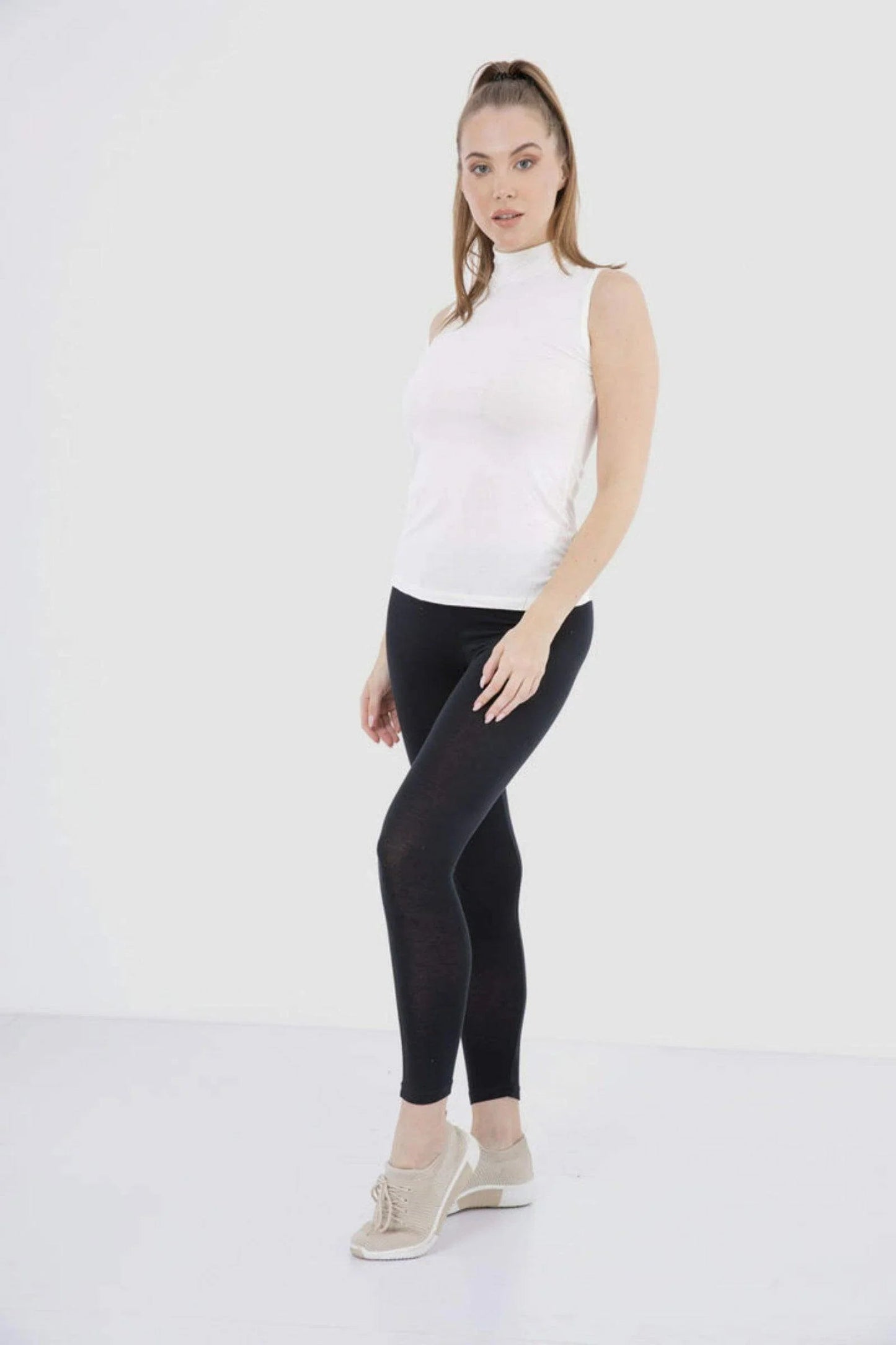 بلوزة بدون أكمام بياقة عالية - Carinasaudi.com