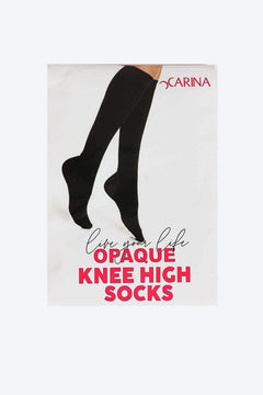 Black opaque knee high socks displayed on neutral background